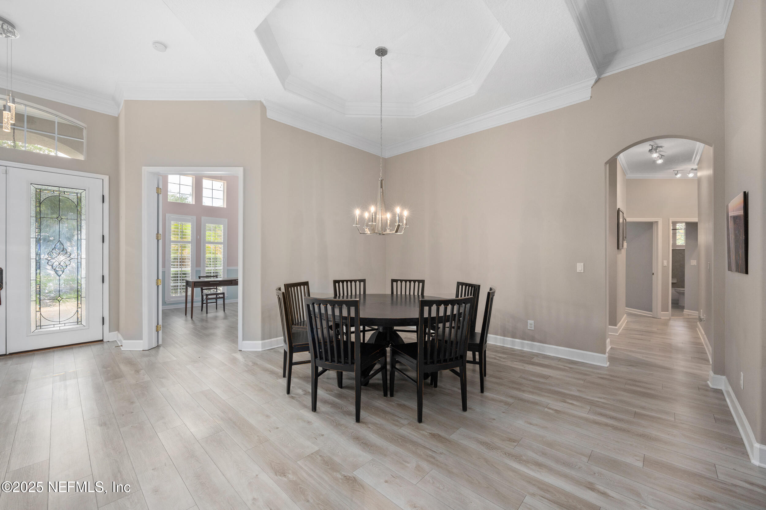 1854 West Cobblestone Lane St. Augustine, FL 32092 - Photo 17 of 72 a view of a dining room with furniture and wooden floor