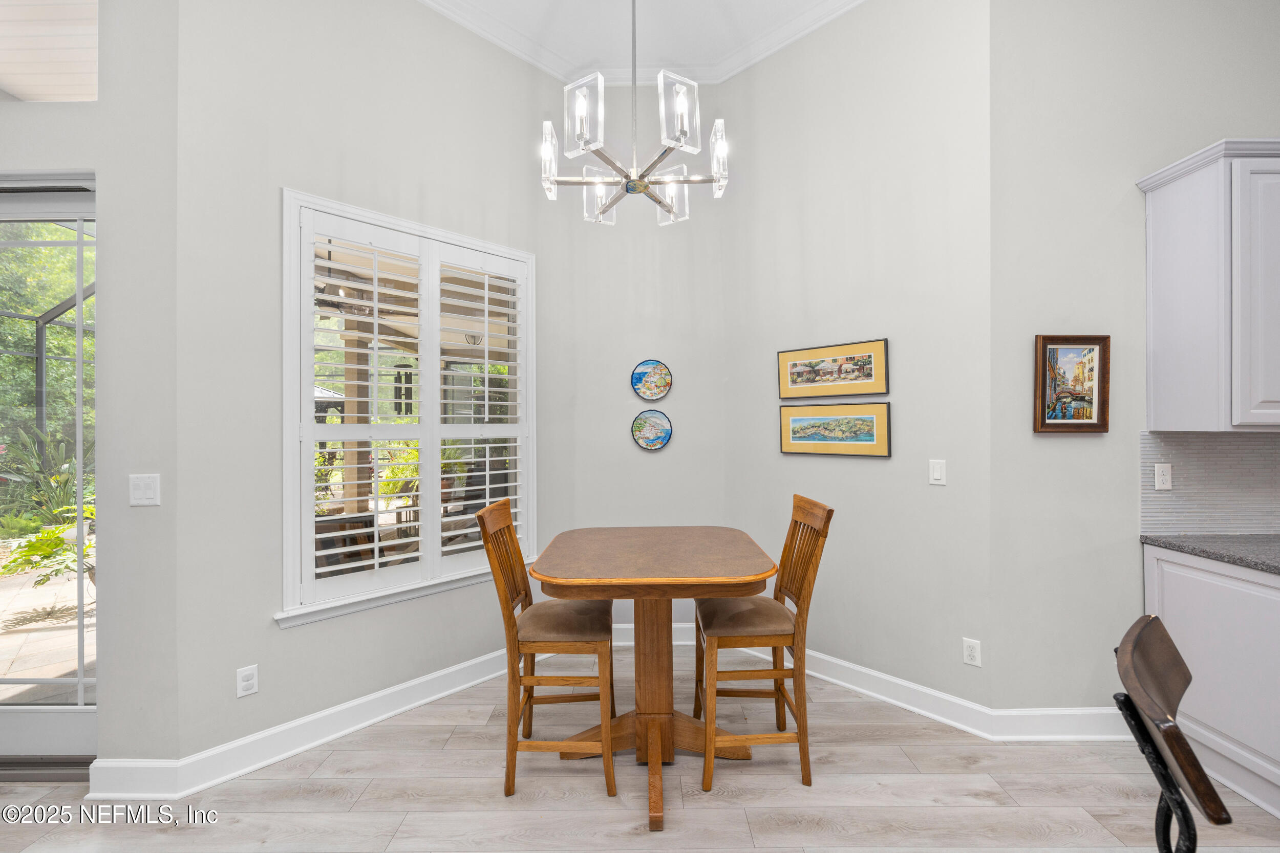 1854 West Cobblestone Lane St. Augustine, FL 32092 - Photo 24 of 72 a dining room with furniture and window