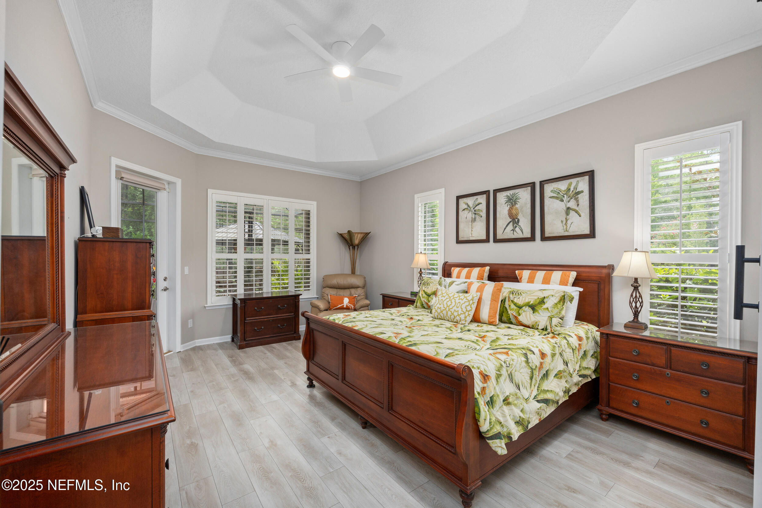 1854 West Cobblestone Lane St. Augustine, FL 32092 - Photo 37 of 72 a bed sitting in a bedroom next to a window