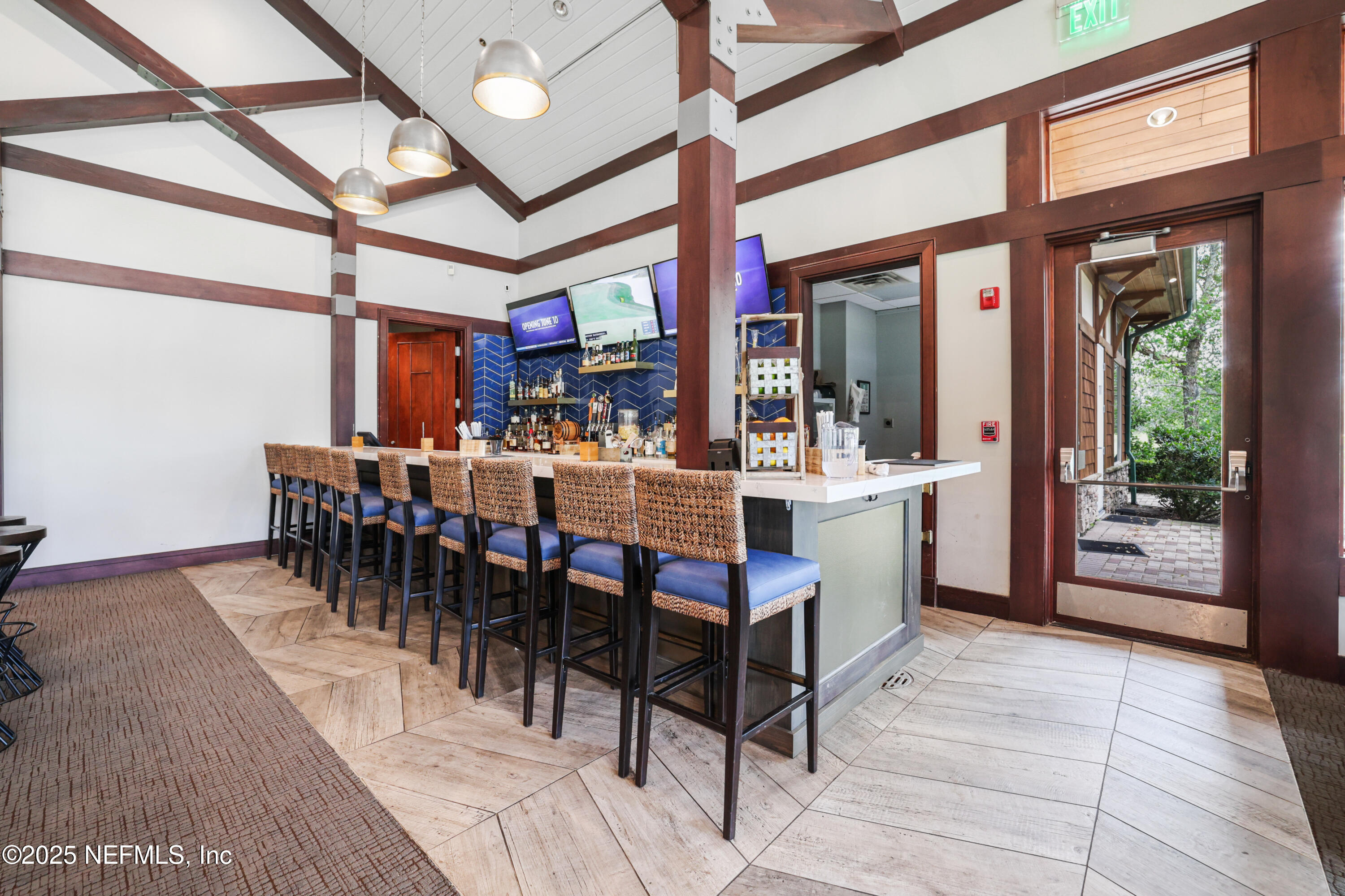 1854 West Cobblestone Lane St. Augustine, FL 32092 - Photo 59 of 72 a large dining hall with a large window and stainless steel appliances