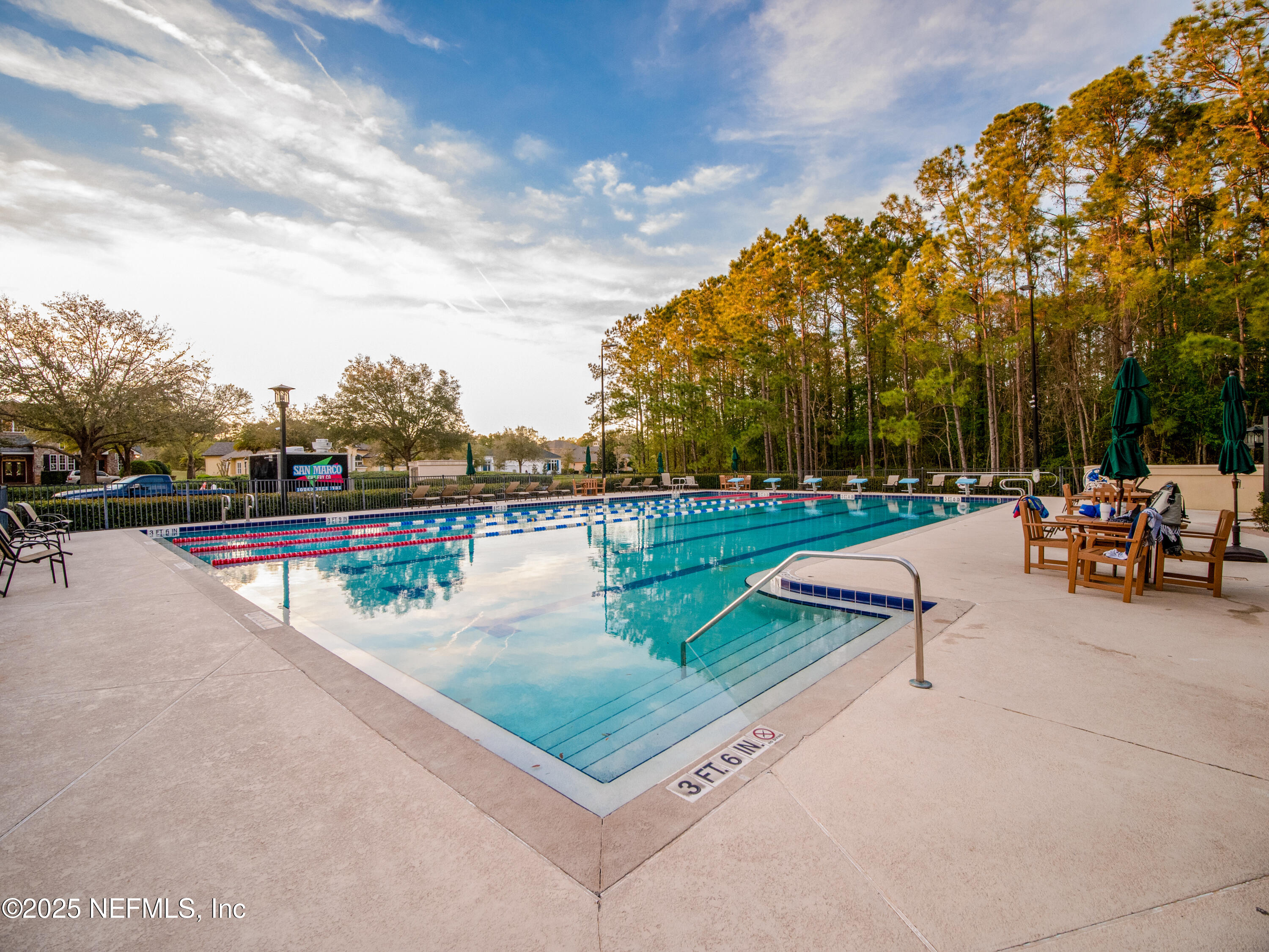 1854 West Cobblestone Lane St. Augustine, FL 32092 - Photo 63 of 72 a view of outdoor space with seating area and trees around