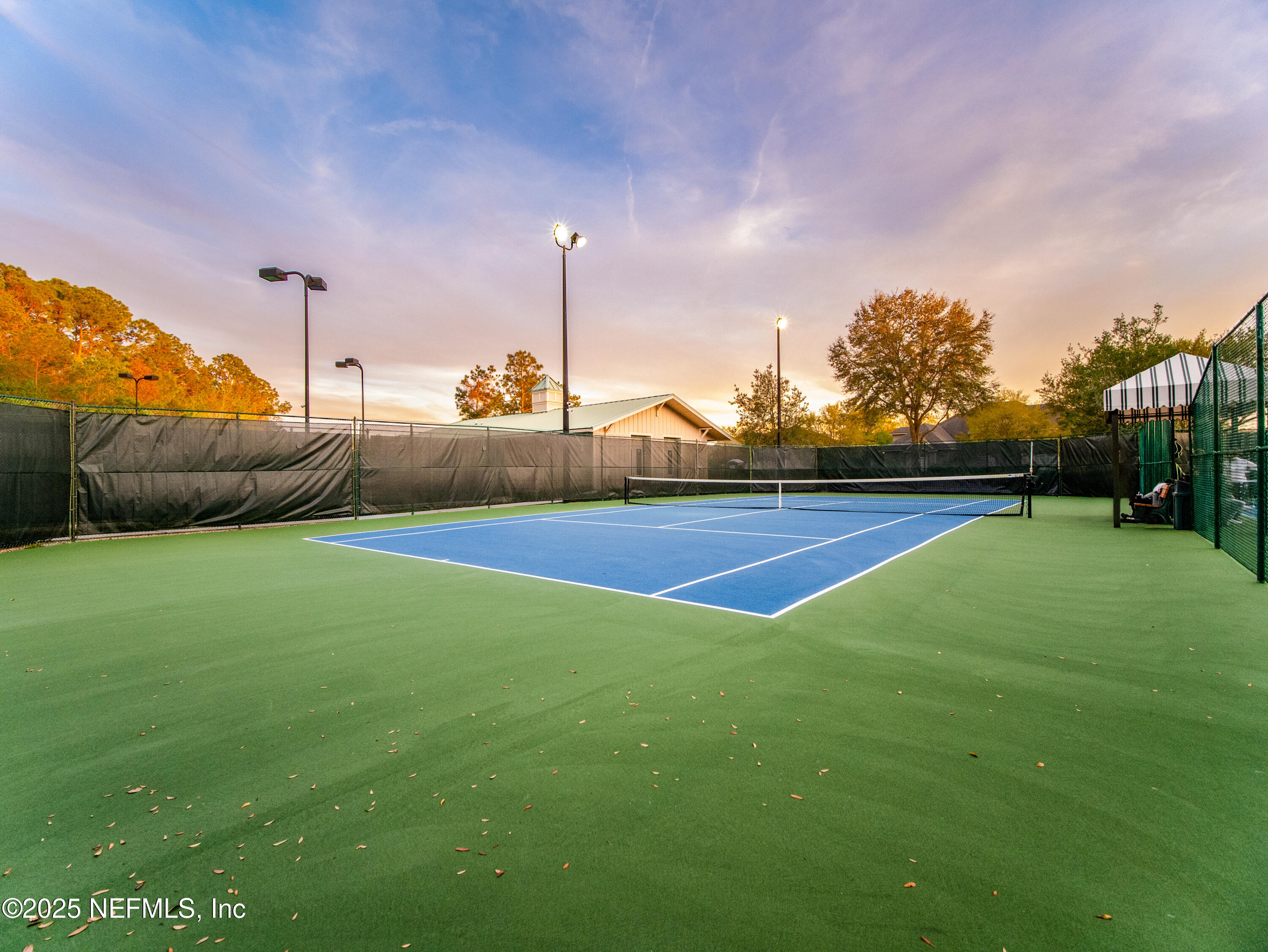 1854 West Cobblestone Lane St. Augustine, FL 32092 - Photo 65 of 72 a view of an outdoor space and tennis court