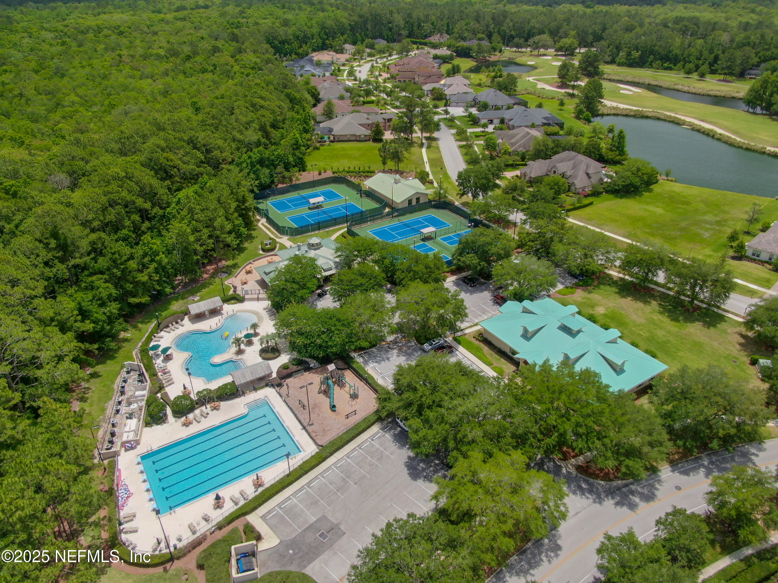 1854 West Cobblestone Lane St. Augustine, FL 32092 - Photo 6 of 72 an aerial view of a residential houses with outdoor space and street view