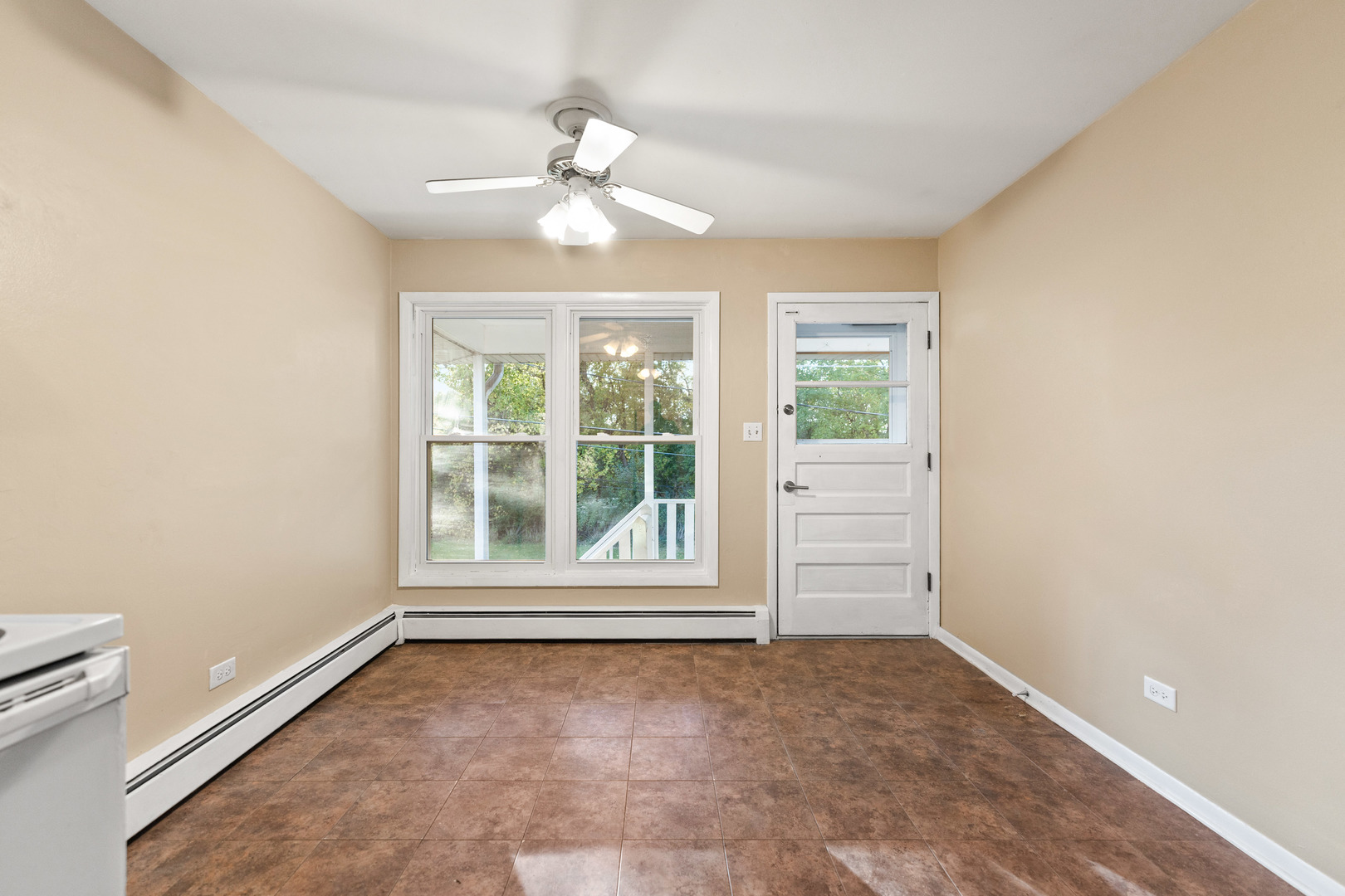 286 Wayne Court, Unit 2 Bartlett, IL 60103 - Photo 20 of 26 a view of an empty room with a window