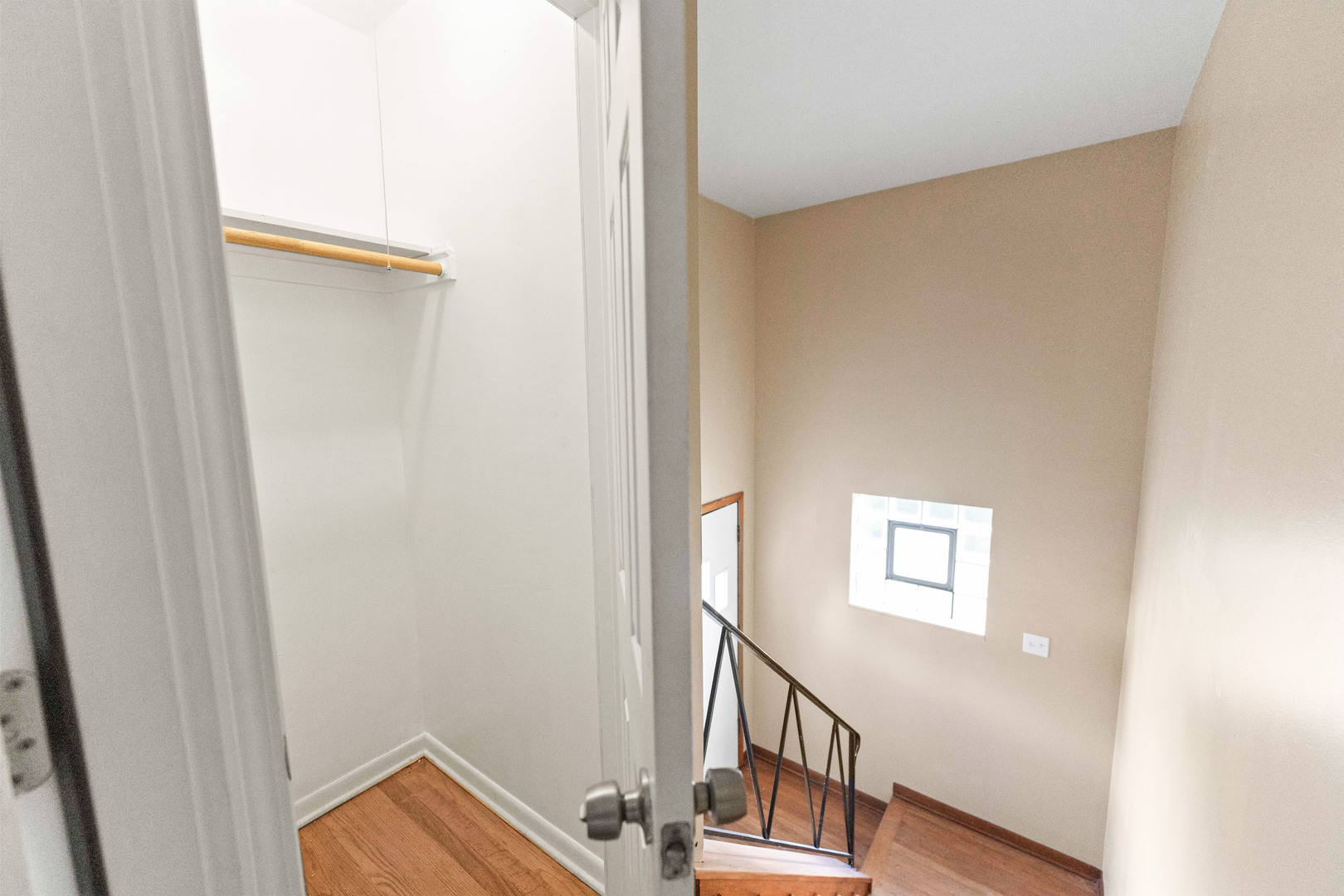 286 Wayne Court, Unit 2 Bartlett, IL 60103 - Photo 22 of 26 a view of a hallway with wooden floor