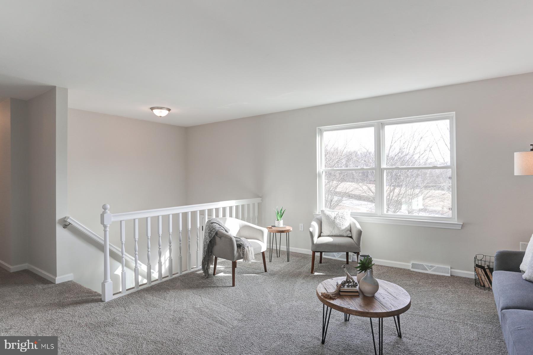 434 Fuhrman Mill Road Hanover, PA 17331 - Photo 8 of 32 a view of a livingroom with a table and chairs