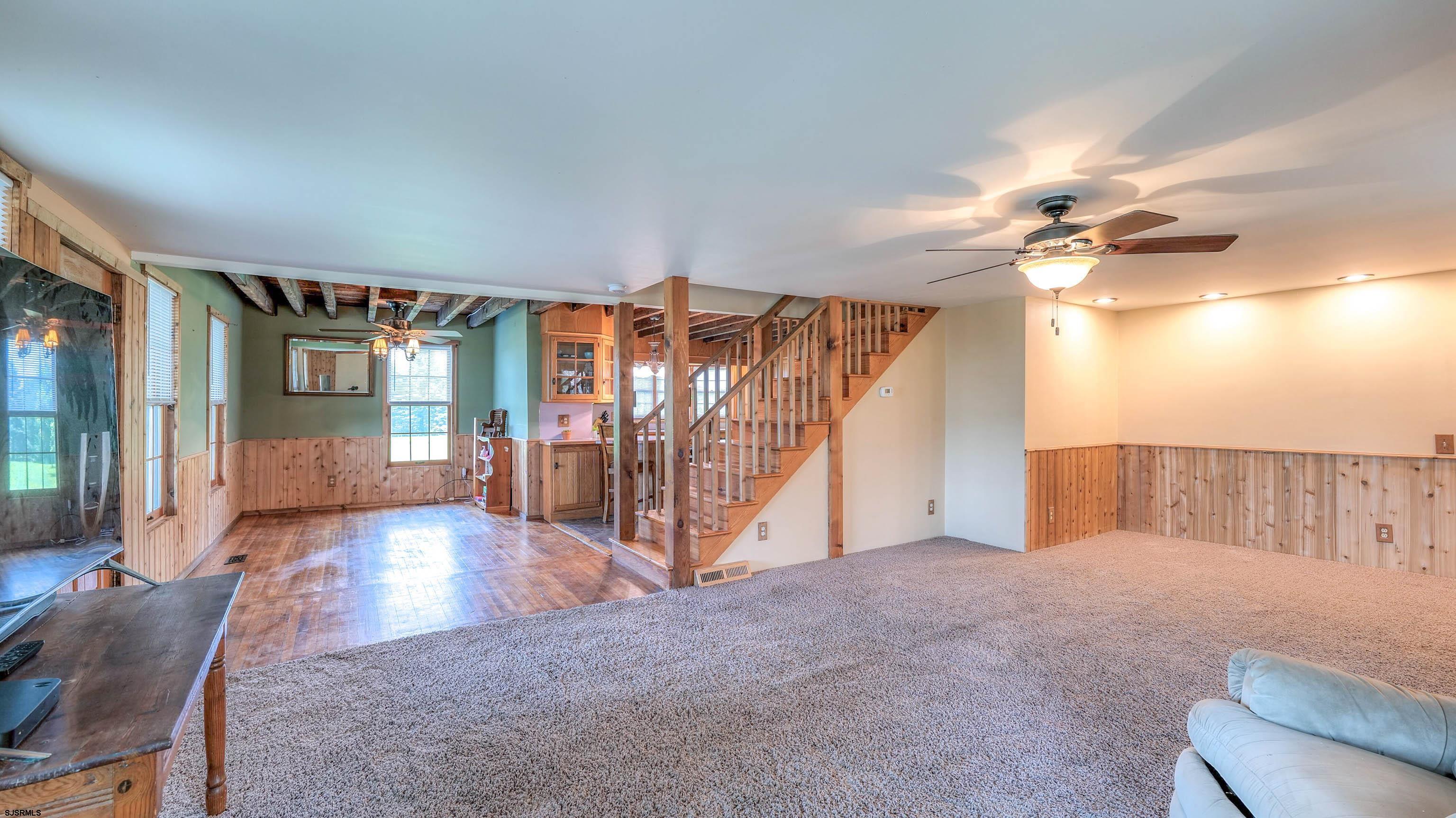 36 Cream Ridge Road Salem, NJ 08079 - Photo 20 of 53 a view of a livingroom with furniture and a ceiling fan