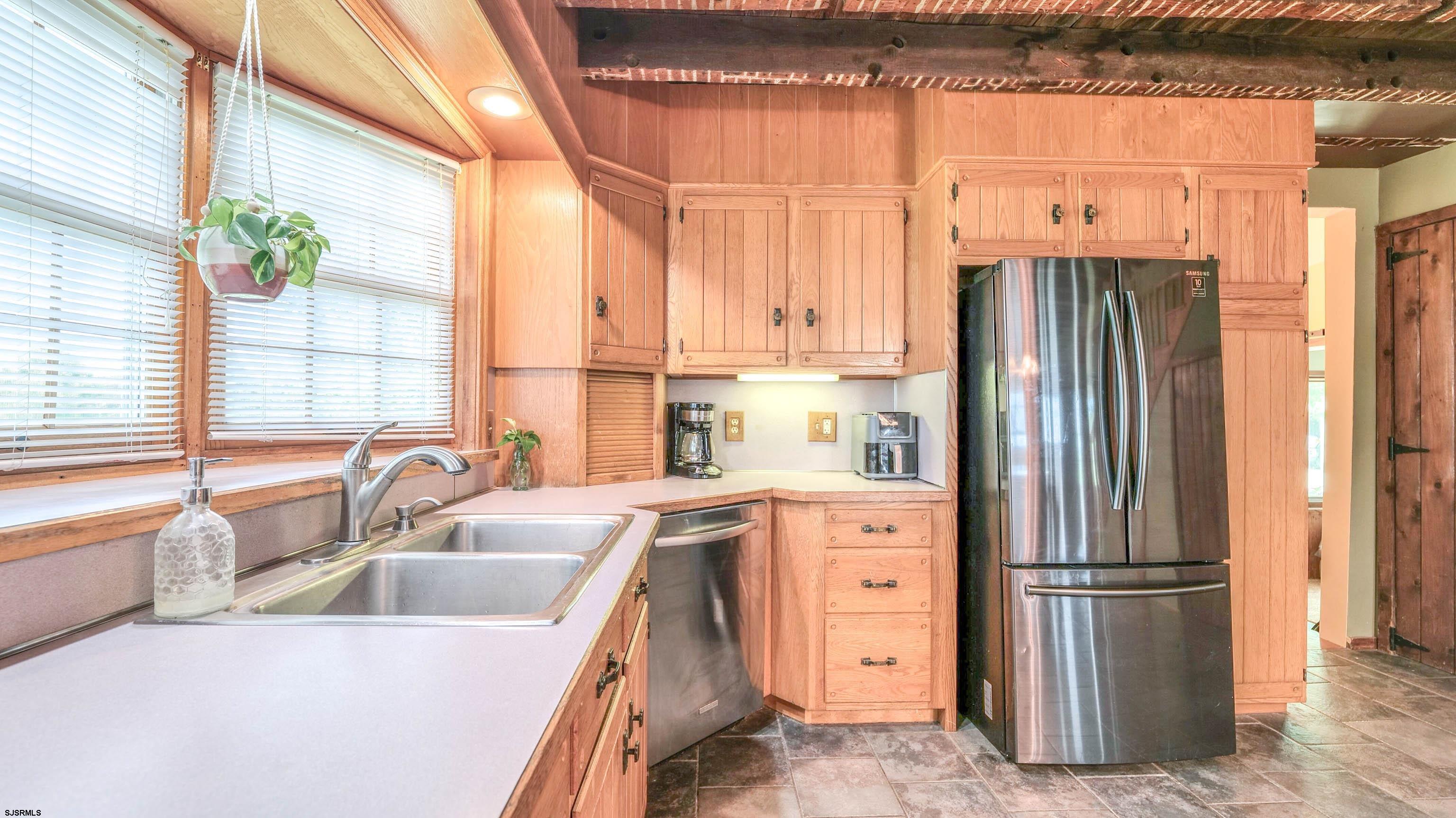 36 Cream Ridge Road Salem, NJ 08079 - Photo 24 of 53 a kitchen with stainless steel appliances a refrigerator and a sink