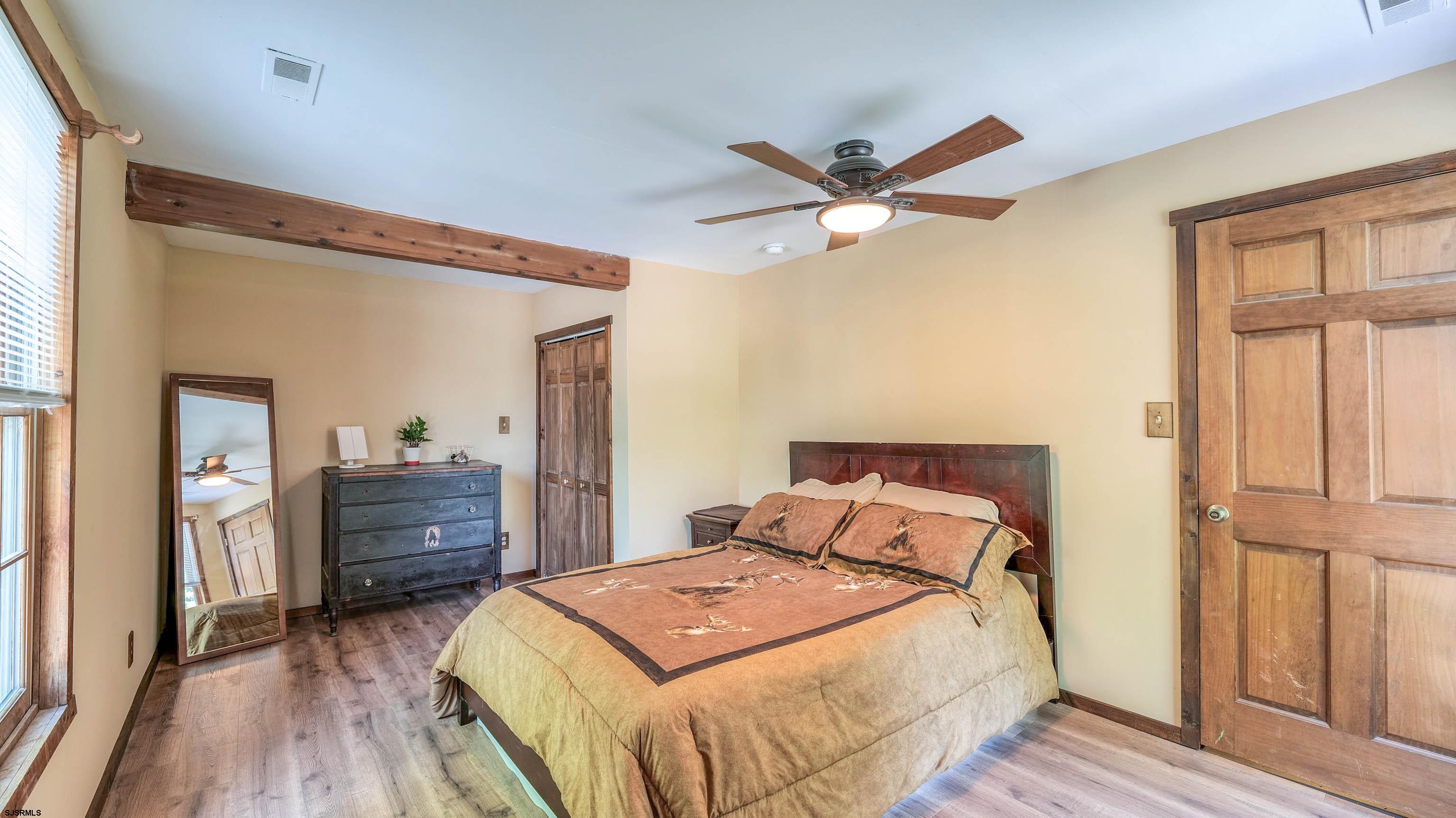 36 Cream Ridge Road Salem, NJ 08079 - Photo 33 of 53 a bedroom with a bed and a dresser