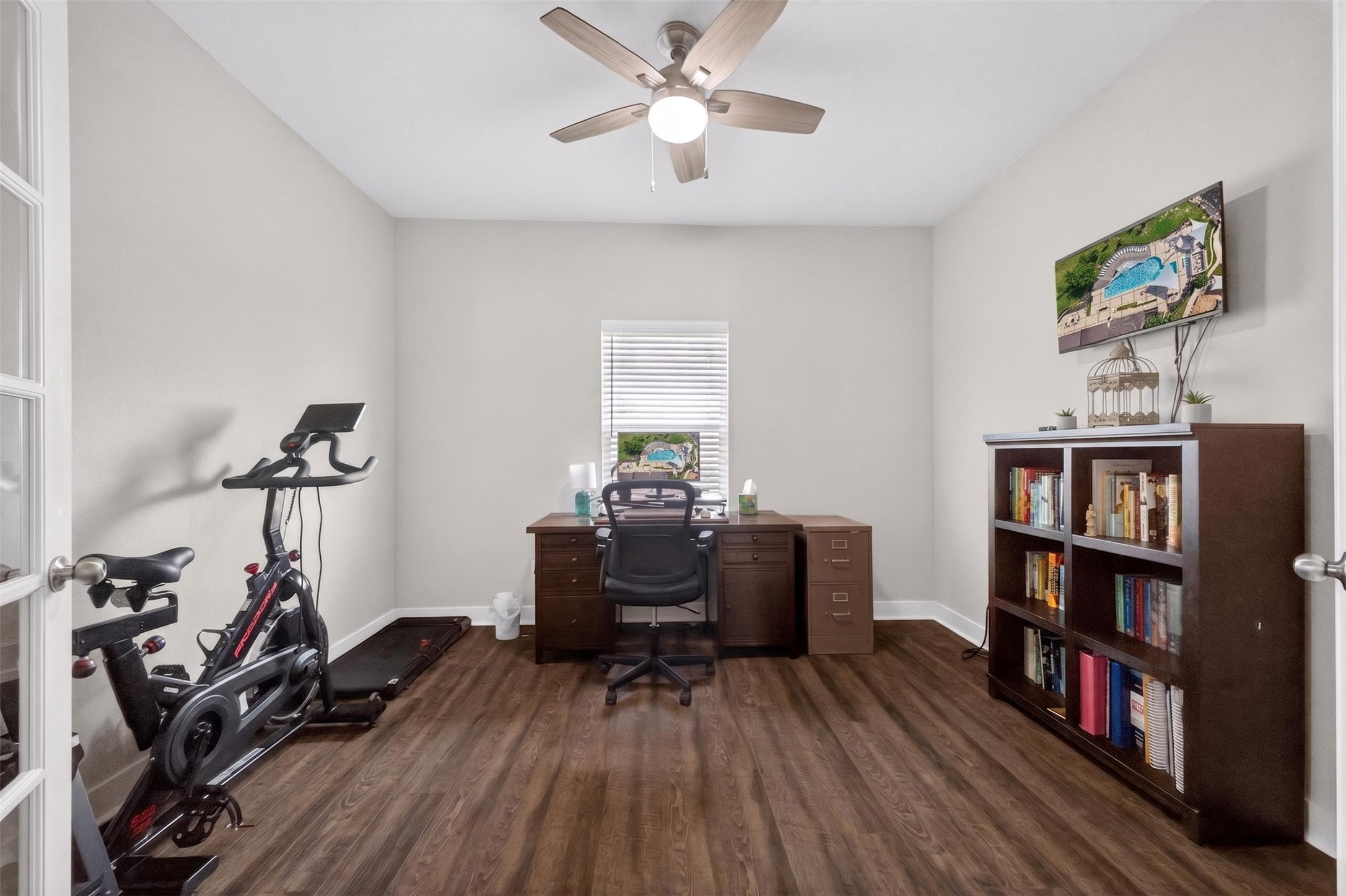 1009 Bright Star Cove Georgetown, TX 78628 - Photo 13 of 40 a view of a workspace with furniture and wooden floor