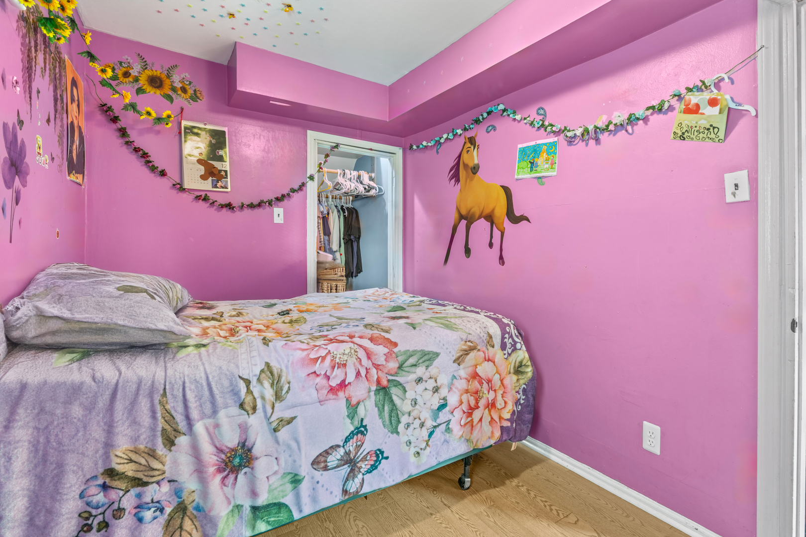 2103 North Long Avenue Chicago, IL 60639 - Photo 12 of 21 a bedroom with a bed and a couch