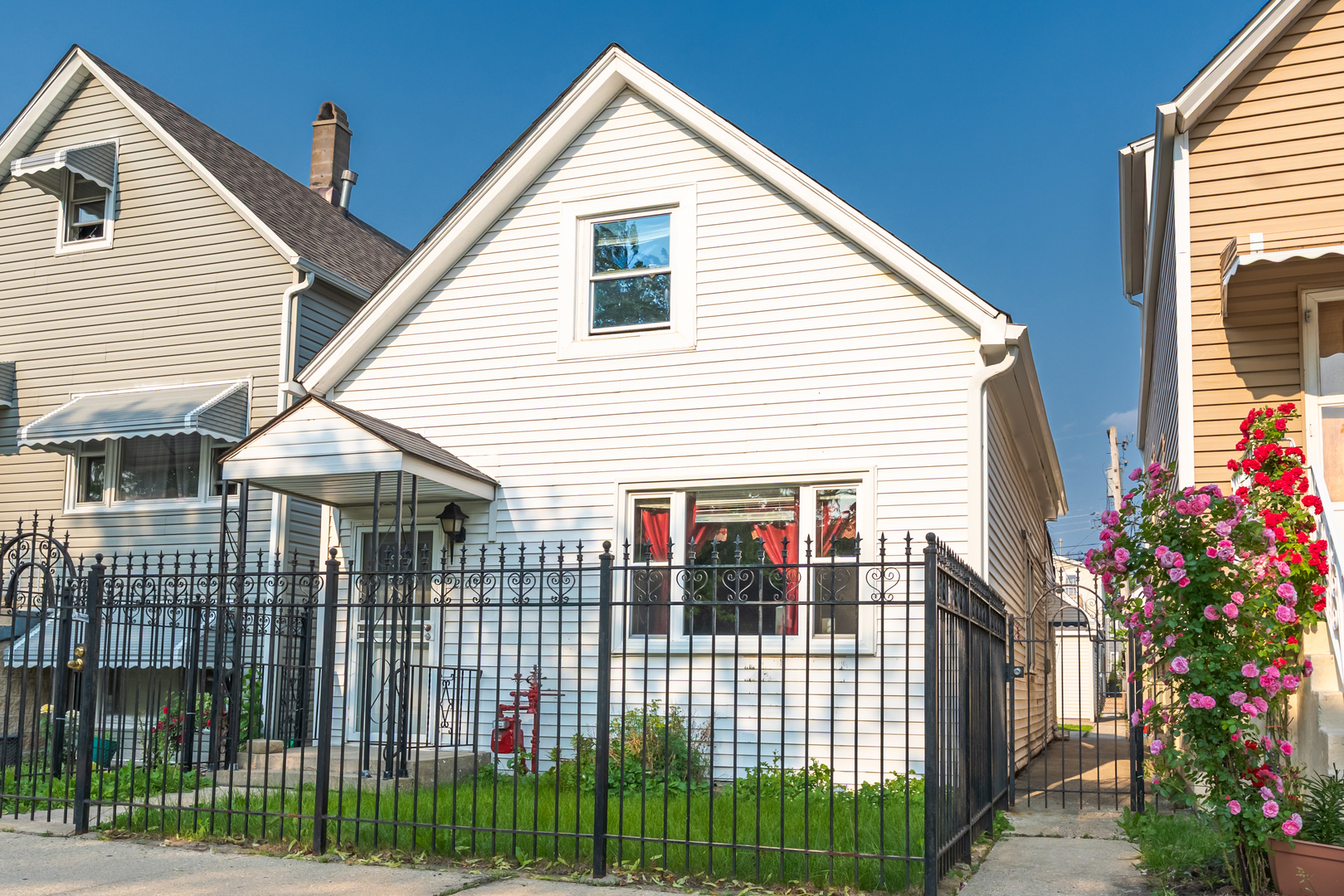 2103 North Long Avenue Chicago, IL 60639 - Photo 2 of 21 a front view of a house with balcony