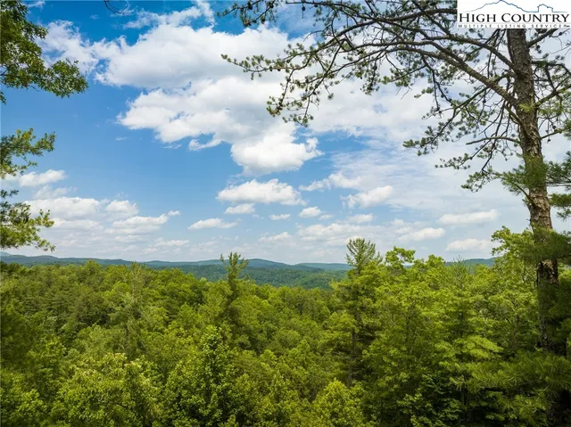 a view of a mountain from a balcony