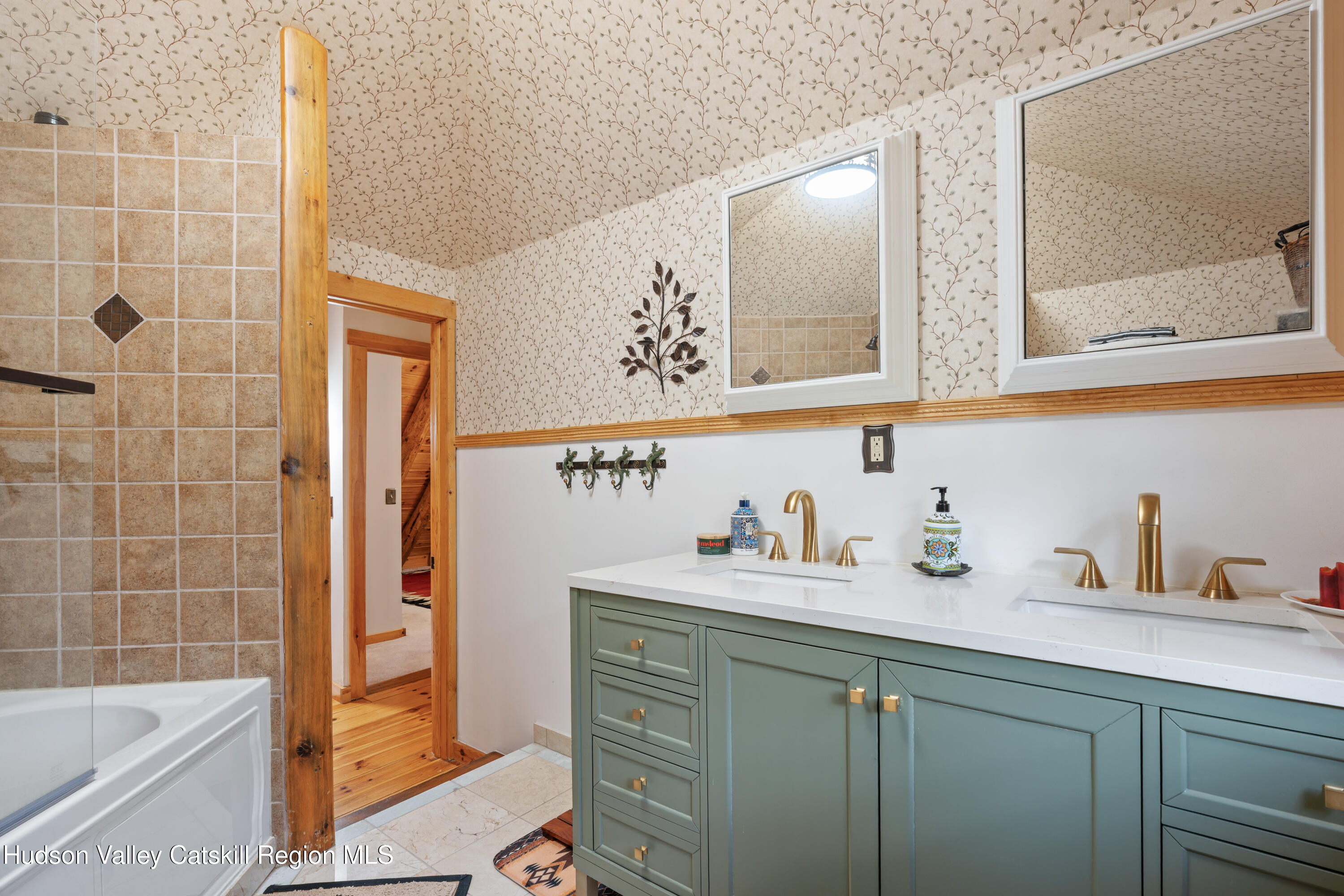 1311 Wittenberg Road Mount Tremper, NY 12457 - Photo 23 of 52 a bathroom with a bathtub sink vanity mirror and toilet