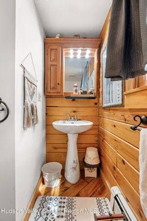 a bedroom with a bed and a walk in closet