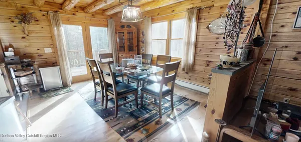 a view of entryway with wooden floor and stairs