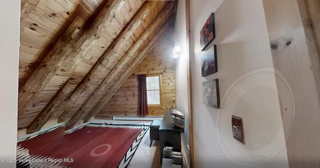 a view of staircase with white walls