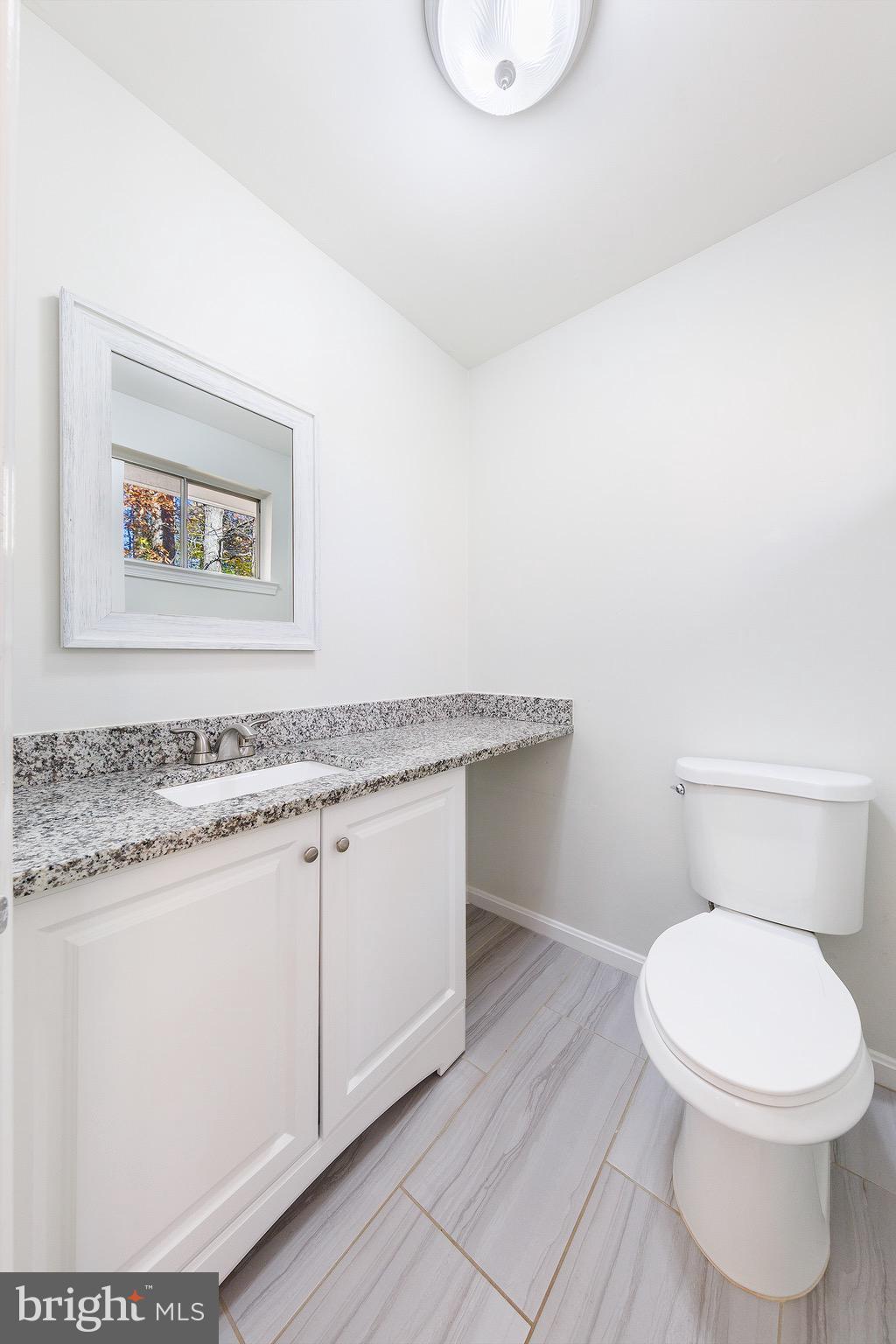 6800 Quebec Court Springfield, VA 22152 - Photo 7 of 44 Half Bath convenient to kitchen/living room/dining