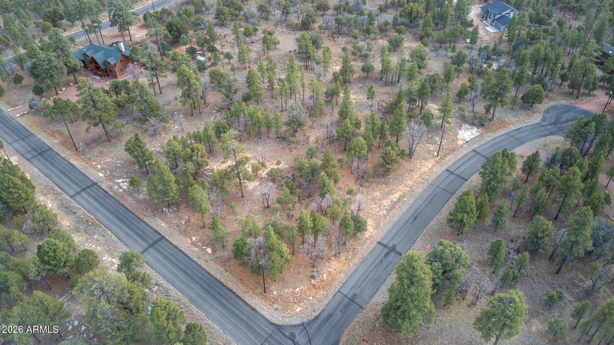 5527 Datil Circle, Unit 325 Happy Jack, AZ 86024 - Photo 14 of 21 a view of a garden from a balcony