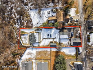 Magnolia Lane Middletown, NJ 07748 - Photo 3 of 4 an aerial view of residential houses with outdoor space