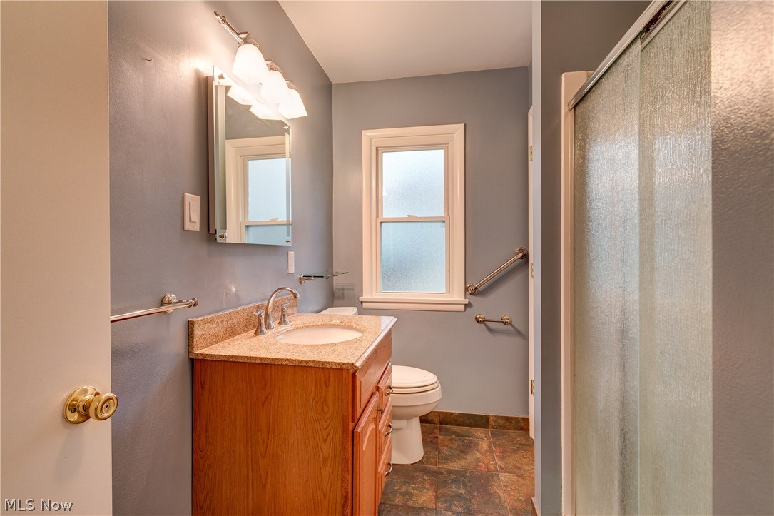 39022 Johnnycake Ridge Road Willoughby, OH 44094 - Photo 13 of 22 Updated 1st floor bath with wider door and walk in shower