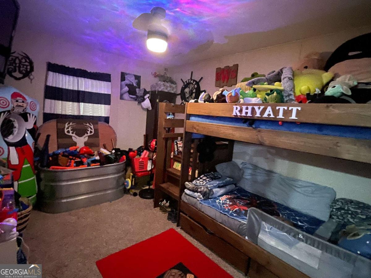 601 Auburn Road Glennville, GA 30427 - Photo 16 of 17 a store room with lots of different kinds of flowers