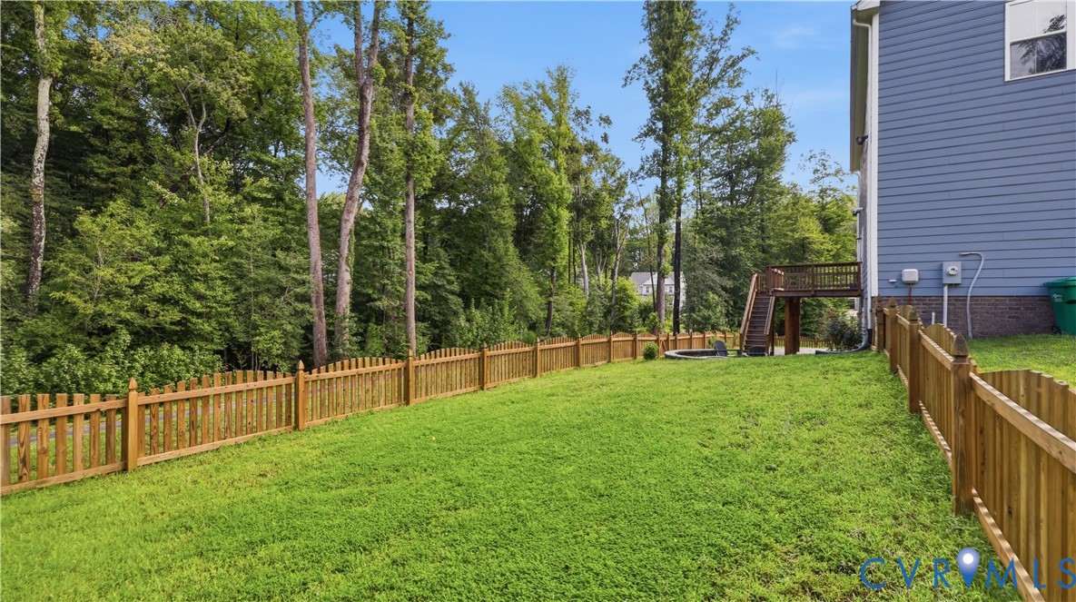 9308 Rudders Point Cove Mechanicsville, VA 23116 - Photo 43 of 50 Expansive lawn with a full wood picket fence, mult