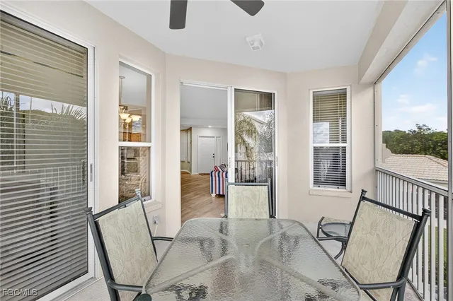a view of a livingroom with furniture and windows