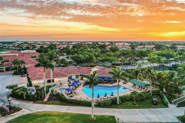 a view of a dining hall with furniture and wooden floor