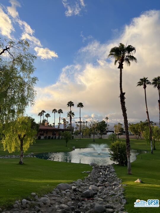 69801 Ramon Road, Unit 28 Cathedral City, CA 92234 - Photo 16 of 20 a view of a lake with a big yard