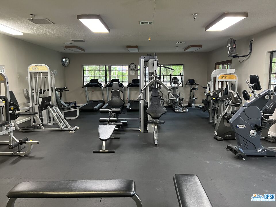 69801 Ramon Road, Unit 28 Cathedral City, CA 92234 - Photo 19 of 20 a view of a room with gym equipment