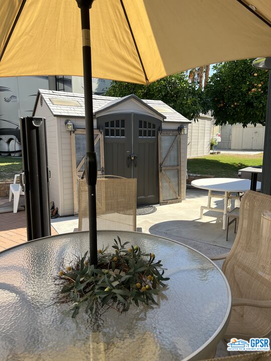 69801 Ramon Road, Unit 28 Cathedral City, CA 92234 - Photo 6 of 20 a front view of a house with a yard