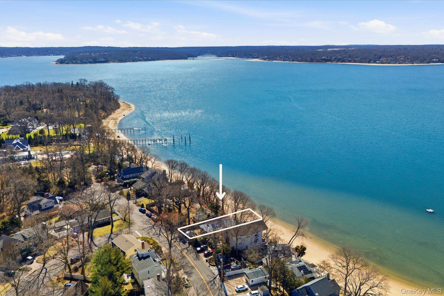 154 Eatons Neck Road Northport, NY 11768 - Photo 34 of 39 a view of a lake in middle of the town