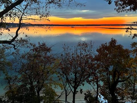 154 Eatons Neck Road Northport, NY 11768 - Photo 38 of 39 a view of lake with green space