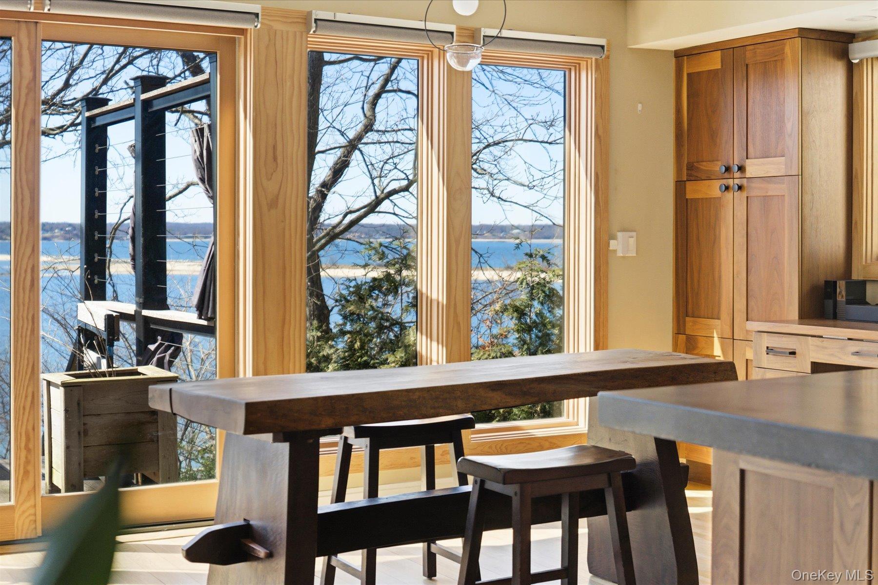 154 Eatons Neck Road Northport, NY 11768 - Photo 8 of 39 a view of a dining room with furniture and window