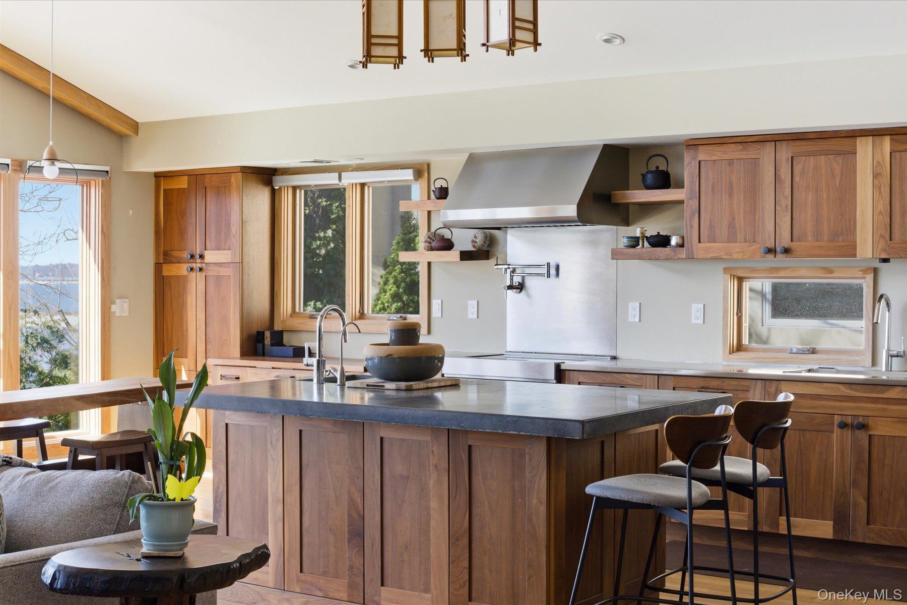 154 Eatons Neck Road Northport, NY 11768 - Photo 9 of 39 a kitchen with stainless steel appliances granite countertop a sink and a counter space