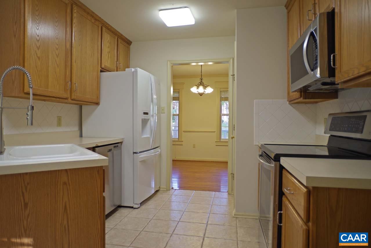 158 Northridge Road Ruckersville, VA 22968 - Photo 17 of 50 a kitchen with a refrigerator and a sink