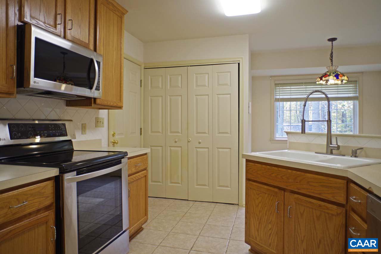 158 Northridge Road Ruckersville, VA 22968 - Photo 20 of 50 a kitchen that has a sink and a stove top oven