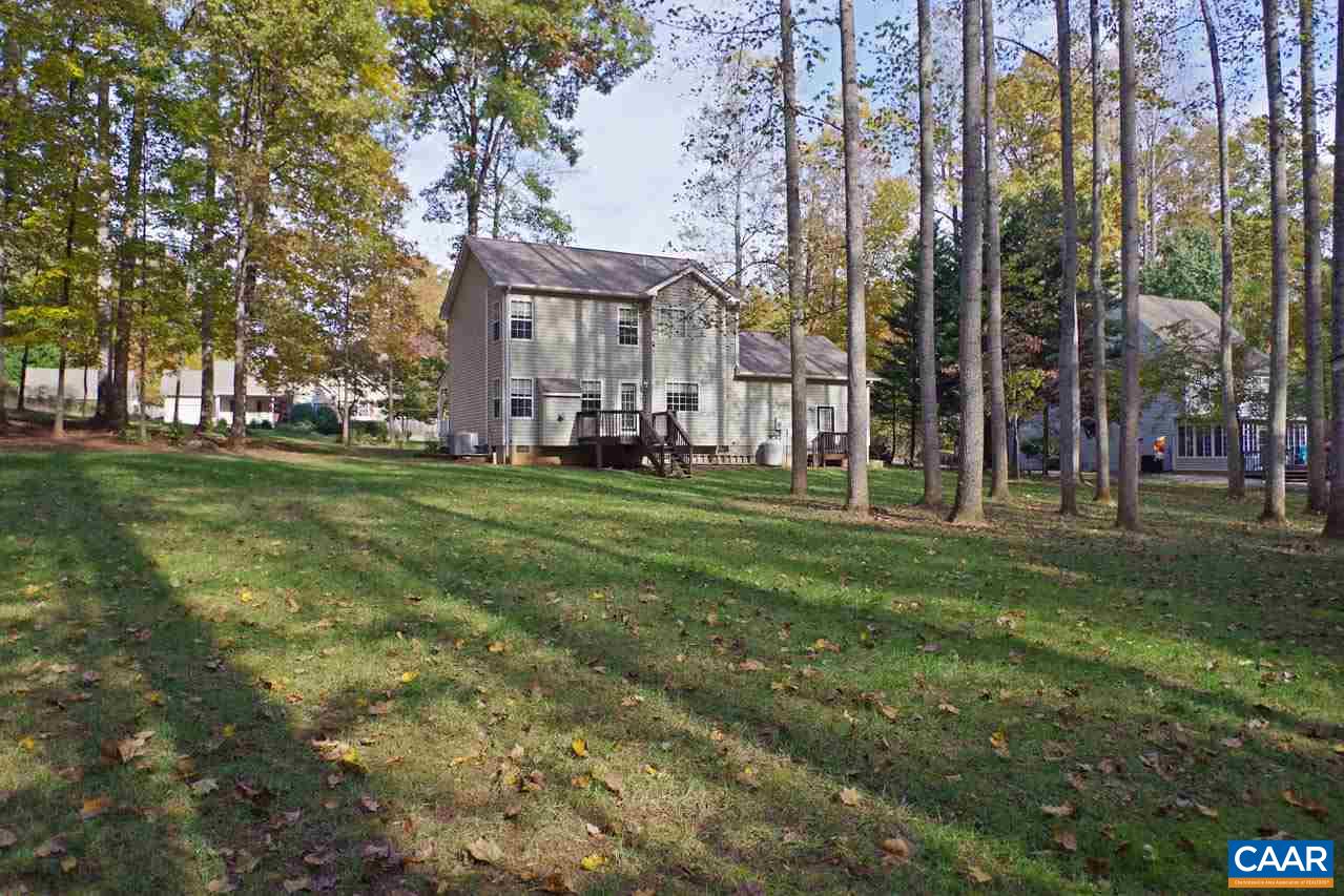 158 Northridge Road Ruckersville, VA 22968 - Photo 47 of 50 a view of a building with a yard