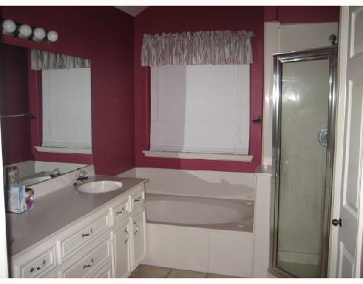 5210 Lethaby Drive Corpus Christi, TX 78413 - Photo 4 of 5 a bathroom with a sink and a mirror