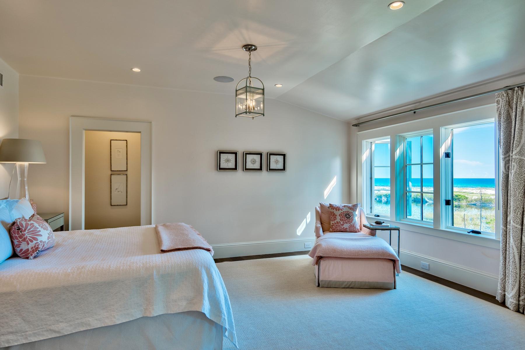 116 Compass Point Way Watersound, FL 32461 - Photo 4 of 33 a bedroom with a bed and wooden floor