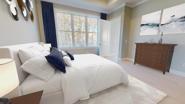 27 Barnes Boulevard, Unit 13 Hudson, MA 01749 - Photo 8 of 12 a bedroom with a bed and window