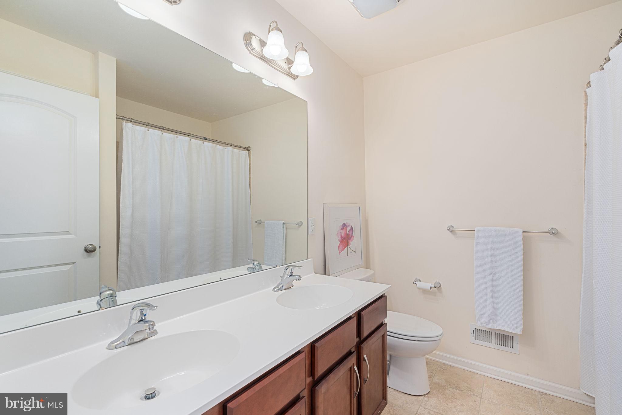 3889 Cephas Child Road, Unit 9 Doylestown, PA 18902 - Photo 23 of 32 Double bowl vanity and linen closet
