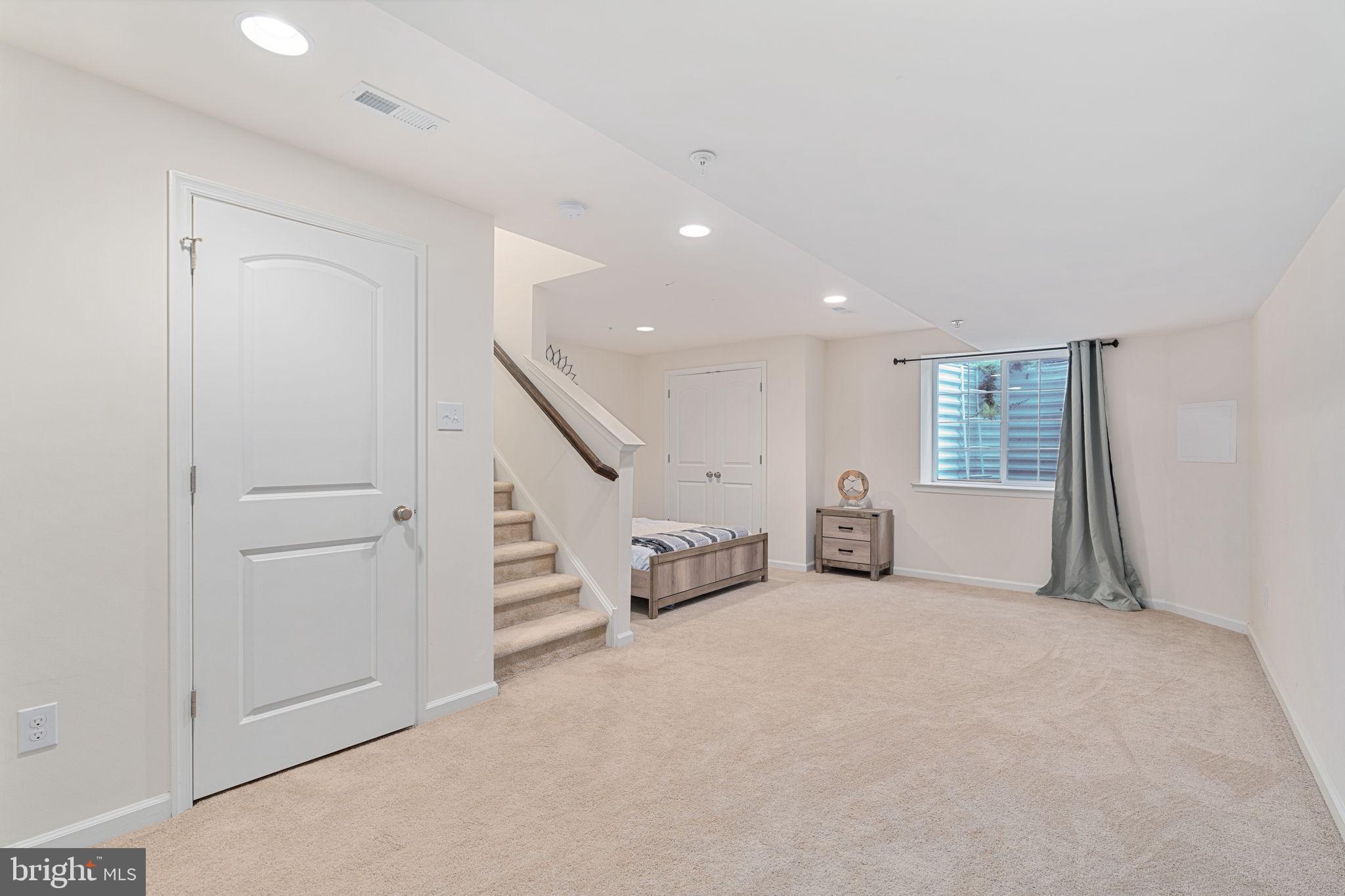 3889 Cephas Child Road, Unit 9 Doylestown, PA 18902 - Photo 30 of 32 Finished basement with recessed lighting