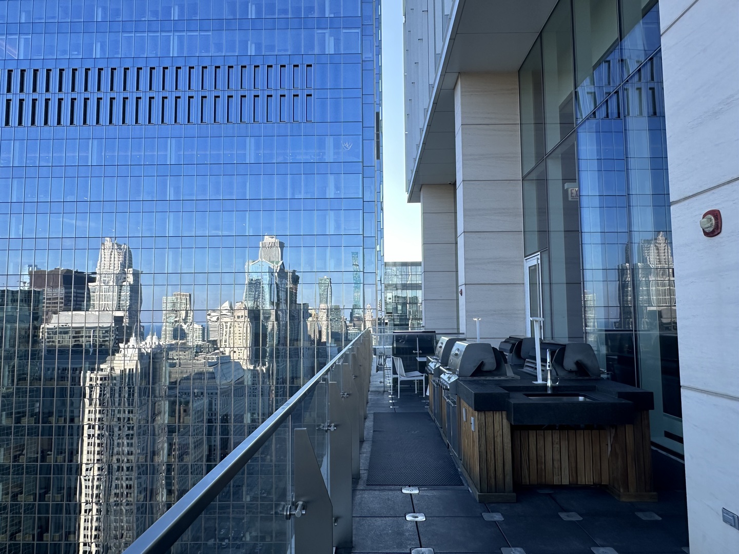 313 West Wolf Point Plaza, Unit 1910 Chicago, IL 60654 - Photo 17 of 30 a view of a balcony with chairs