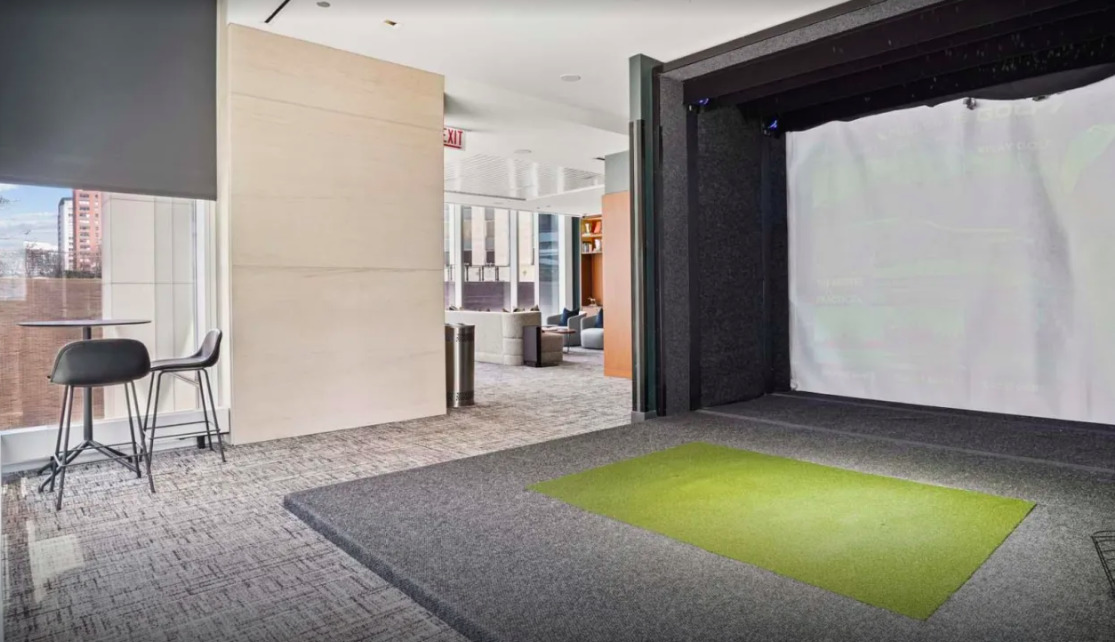 313 West Wolf Point Plaza, Unit 1910 Chicago, IL 60654 - Photo 24 of 30 a view of an empty room with wooden floor and a cabinet