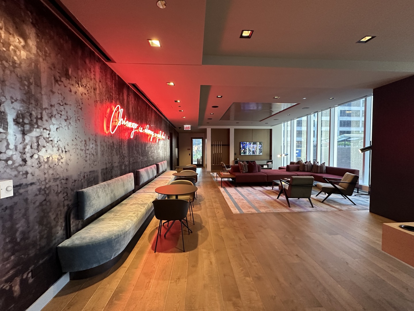 313 West Wolf Point Plaza, Unit 1910 Chicago, IL 60654 - Photo 28 of 30 a living room with furniture and a flat screen tv