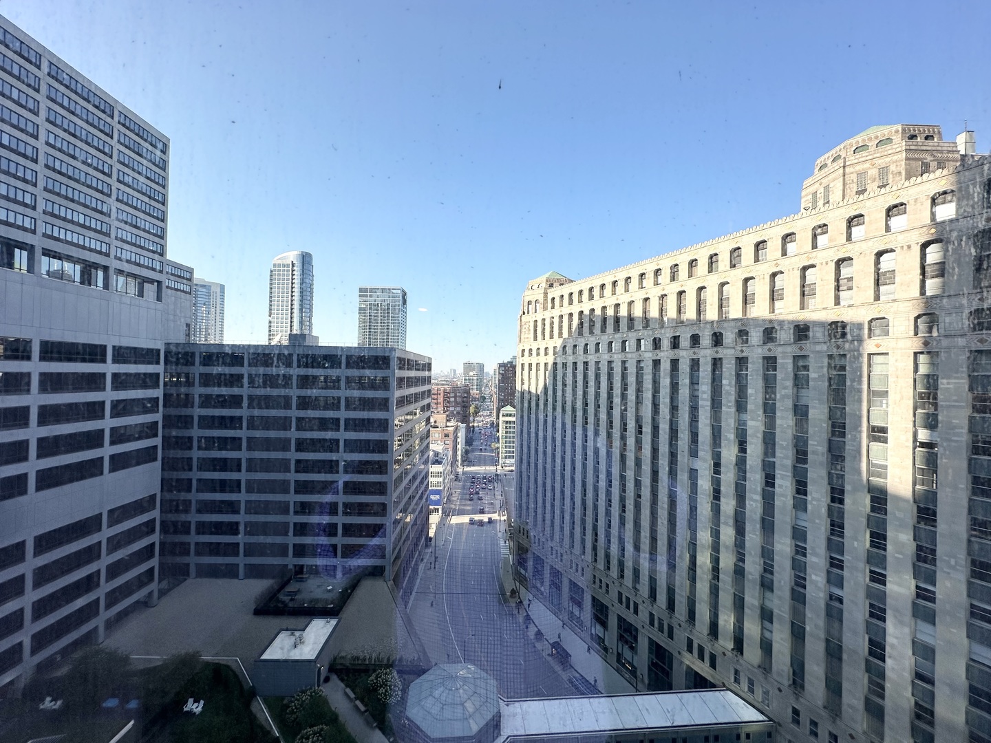313 West Wolf Point Plaza, Unit 1910 Chicago, IL 60654 - Photo 8 of 30 a view of a balcony with wooden floor