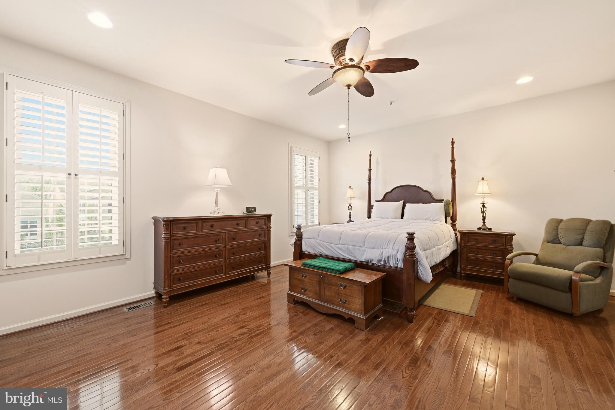 1104 Sweetbay Place Silver Spring, MD 20906 - Photo 20 of 43 a bedroom with furniture and wooden floor