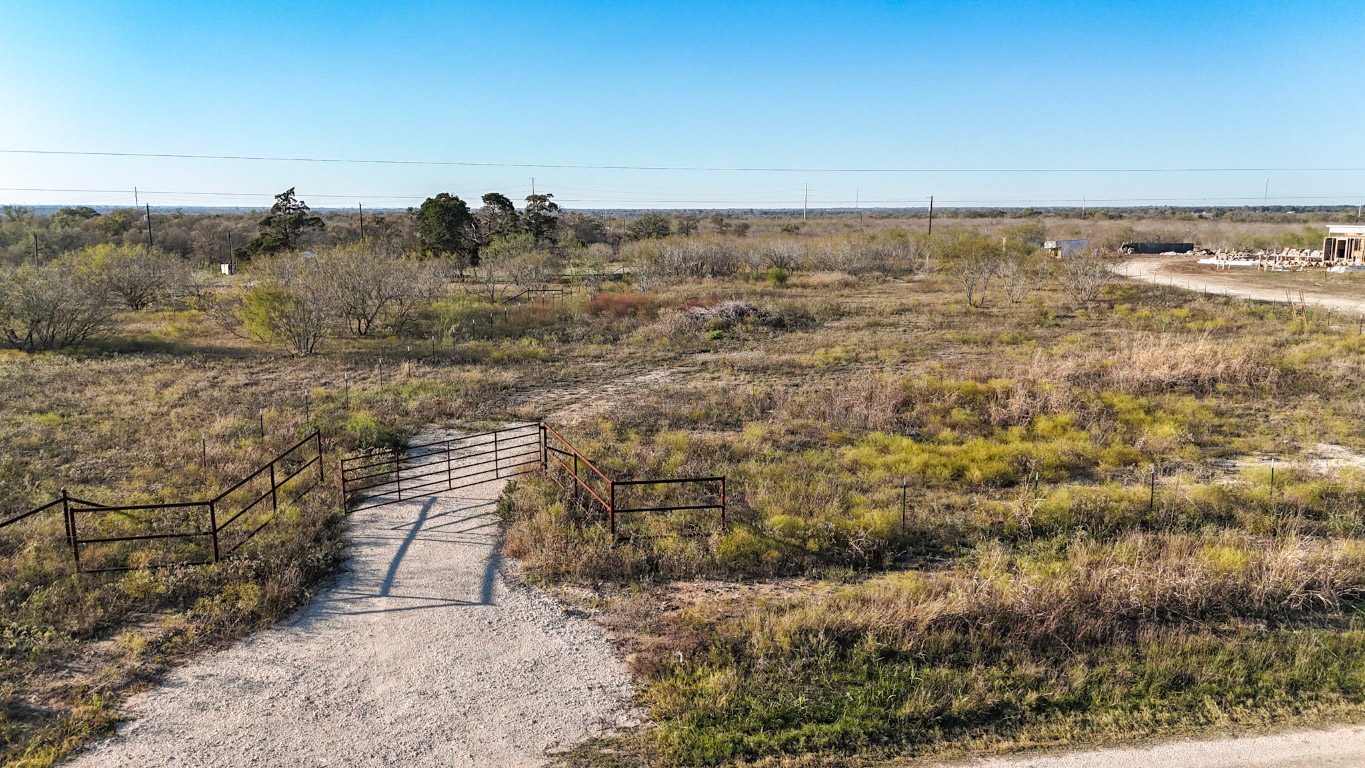 115 Spanish Oak Road Dale, TX 78616 - Photo 3 of 8 View of property featuring a view of rural / pastoral area and a gate